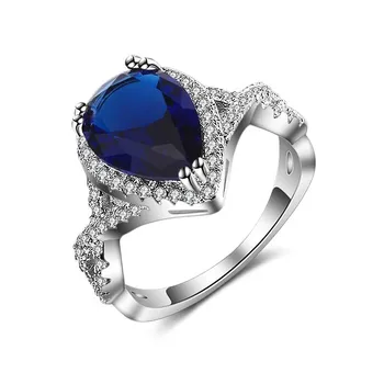 Pozlačen prstan v kraljevsko modra pear obliko